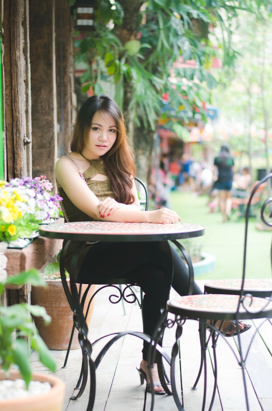 Thai woman at an outdoor cafe
